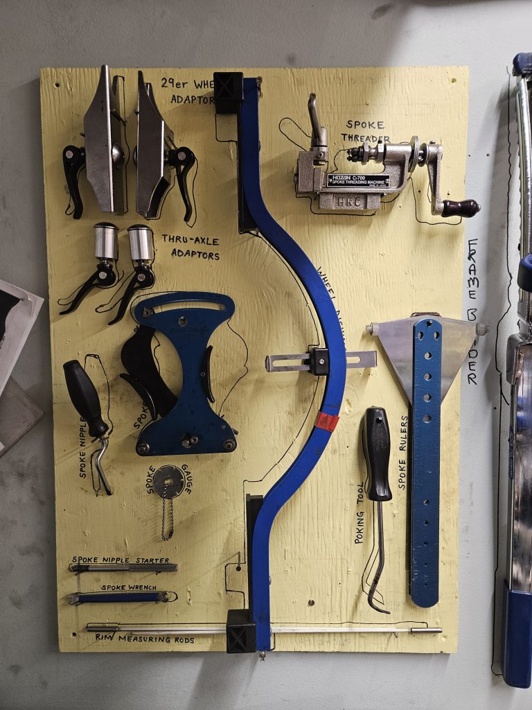 This is the board with wheel tools. There are spoke gauges, rulers, threaders and tensiometers. There is a dishing tool and adapters for large wheels.